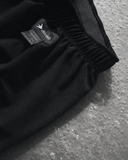 Pantalon Vertikal noir Divag, détail de la ceinture et des étiquettes